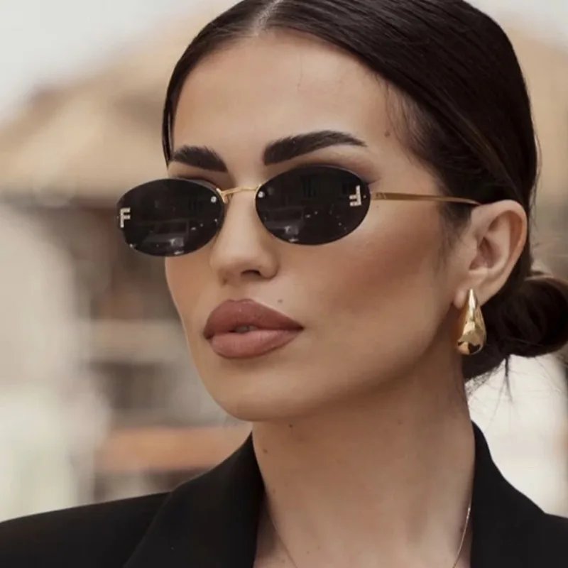 New Luxury F Letter Frameless Sunglasses Oval Retro Small Frame Sunglasses UV400 Protective women's fashion Metal sunglasses